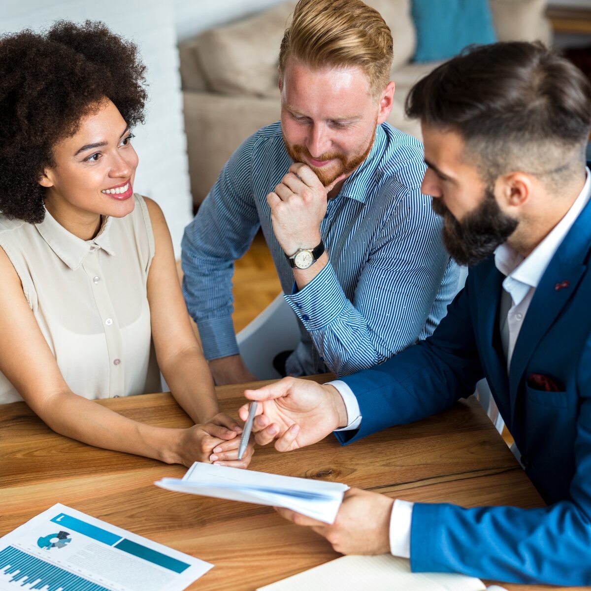 Young,Couple,With,A,Real,Estate,Agent.,Buying,New,House.